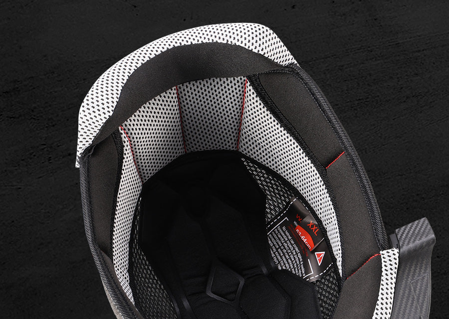 Close-up of the interior of the Oumurs 806 Matte Black off-road helmet, showing breathable mesh liner and padding for comfort.