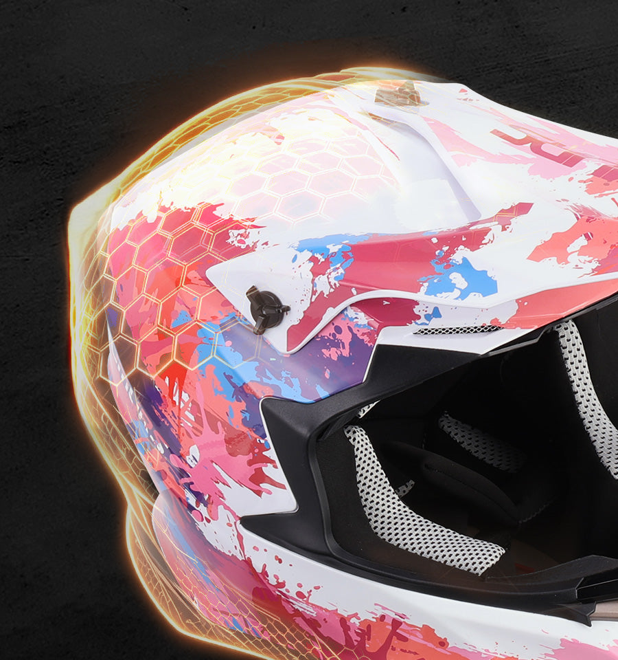 A close-up of a full-face motorcycle helmet with a vibrant abstract paint splatter design in pink, blue, and white, featuring a glowing orange-yellow outline effect against a dark background.