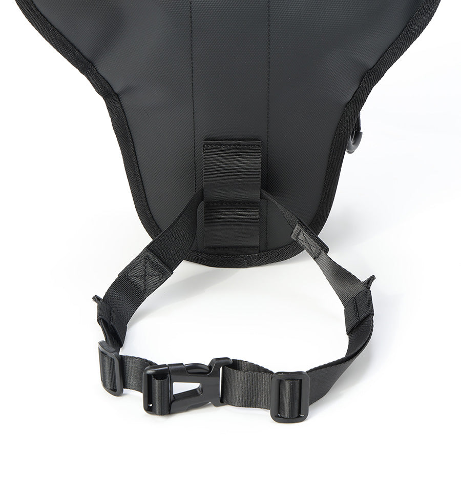 Rear view of an Oumurs motorcycle leg bag showing the adjustable thigh strap and side-release buckle