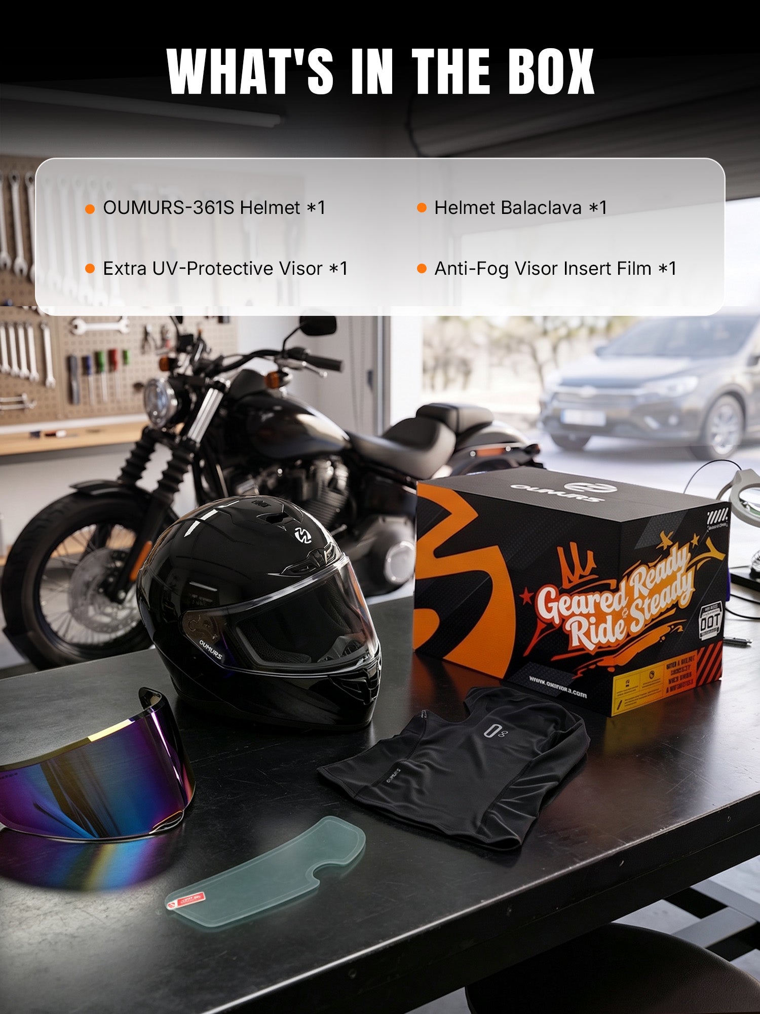 Oumurs helmet package displayed on a table in a garage, with an Oumurs-361S cosmo black full-face helmet, a UV-protective visor, an anti-fog visor film, and a balaclava. 