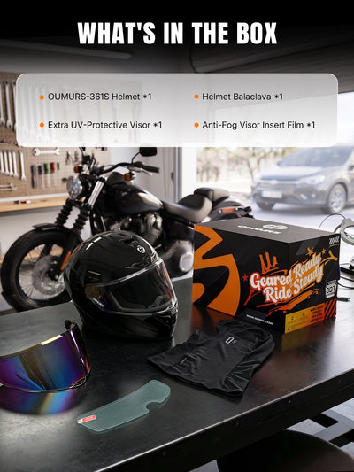 Oumurs helmet package displayed on a table in a garage, with an Oumurs-361S cosmo black full-face helmet, a UV-protective visor, an anti-fog visor film, and a balaclava. 
