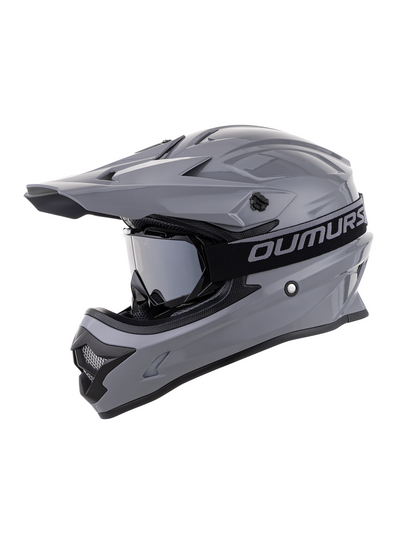 Oumurs 805 gray motocross helmet with matching goggles, left front three-quarter view