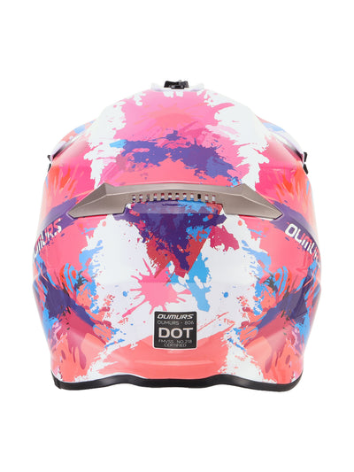 A full-face motorcycle helmet with a vibrant abstract paint splatter pattern in pink, purple, blue, and white. The helmet features a silver visor, a black rear window, and a black DOT certification sticker on the back.