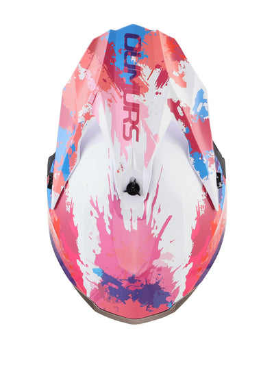 A Darkspeed motocross helmet shown from the front, featuring a vibrant abstract paint splatter design in pink, blue, and purple over a white base.