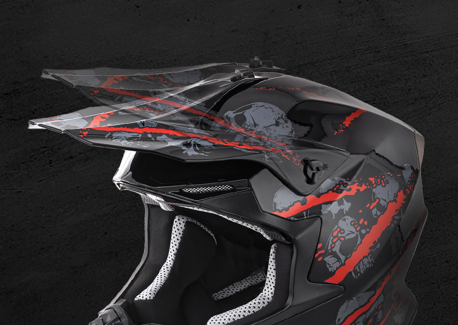 Close-up of the Oumurs 806 Red Skull off-road helmet's adjustable peak lifted at an different angle.