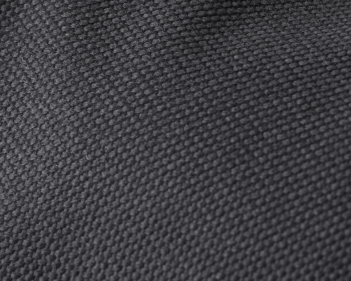 Close-up of a dark gray woven fabric texture with a fine ribbed pattern.