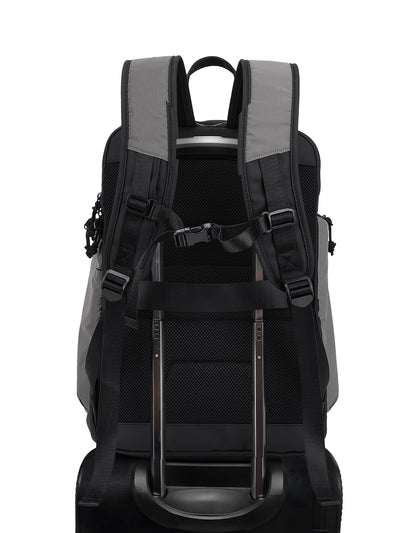 The back view of a black and gray rolling backpack with a LUGGAGE telescoping handle extended, shown against a plain white background.